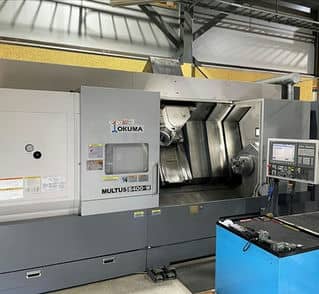 GEBRAUCHTES CNC-DREH- UND FRÄSZENTRUM OKUMA, MODELL MULTUS B 400 W 2011