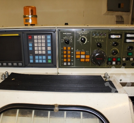 CNC-TAKANG TNC 24 CNC-Drehmaschine mit Stangenlader Baujahr 1994